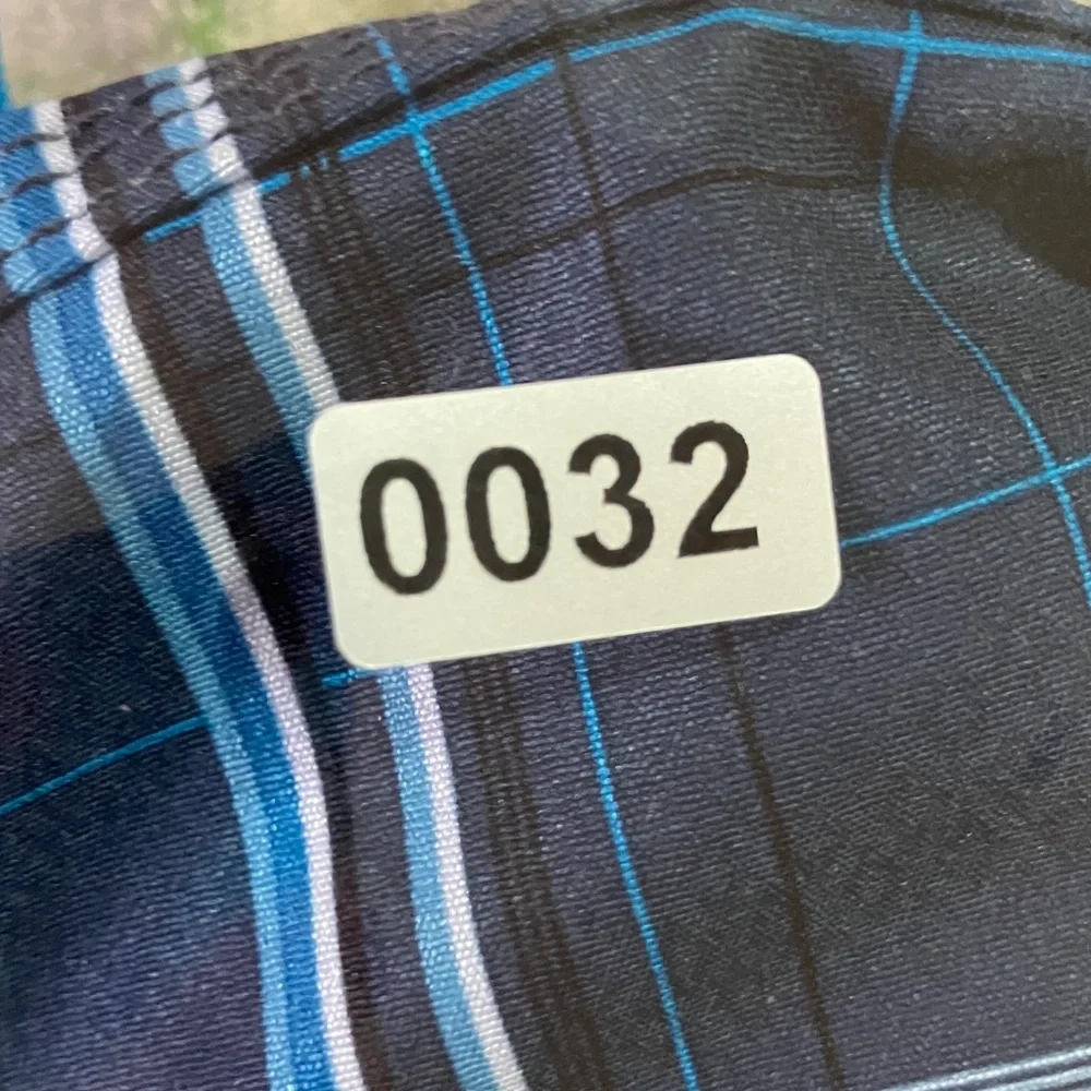 Quicksilver blue plaid surfer shorts swim trunks size 34 excellent condition‎